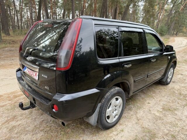 Черный Ниссан ИксТрейл, объемом двигателя 2.2 л и пробегом 225 тыс. км за 3800 $, фото 2 на Automoto.ua