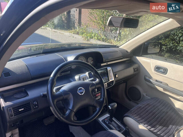 Черный Ниссан ИксТрейл, объемом двигателя 2.49 л и пробегом 176 тыс. км за 7800 $, фото 7 на Automoto.ua