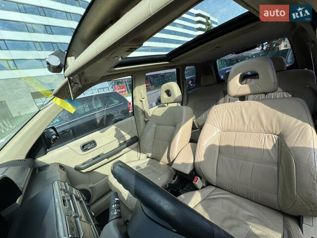 Черный Ниссан ИксТрейл, объемом двигателя 2.5 л и пробегом 318 тыс. км за 8000 $, фото 16 на Automoto.ua