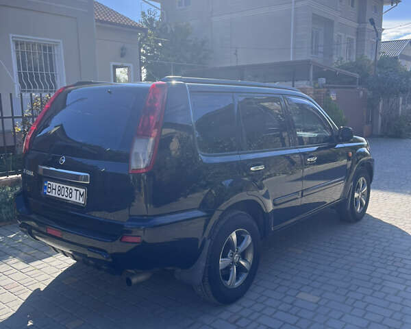 Черный Ниссан ИксТрейл, объемом двигателя 2.49 л и пробегом 176 тыс. км за 7800 $, фото 11 на Automoto.ua