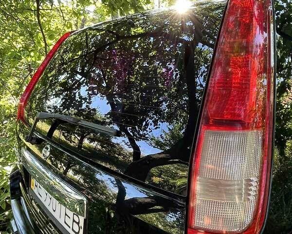 Черный Ниссан ИксТрейл, объемом двигателя 2.5 л и пробегом 287 тыс. км за 7700 $, фото 4 на Automoto.ua