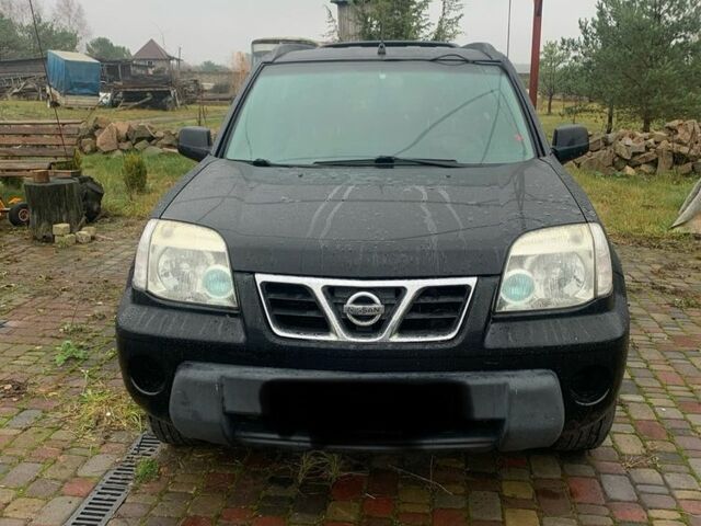 Черный Ниссан ИксТрейл, объемом двигателя 2.2 л и пробегом 370 тыс. км за 2950 $, фото 1 на Automoto.ua