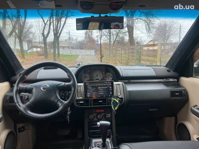 Чорний Ніссан ІксТрейл, об'ємом двигуна 2 л та пробігом 215 тис. км за 6490 $, фото 14 на Automoto.ua
