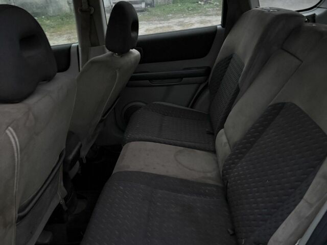 Черный Ниссан ИксТрейл, объемом двигателя 2.2 л и пробегом 278 тыс. км за 2800 $, фото 7 на Automoto.ua