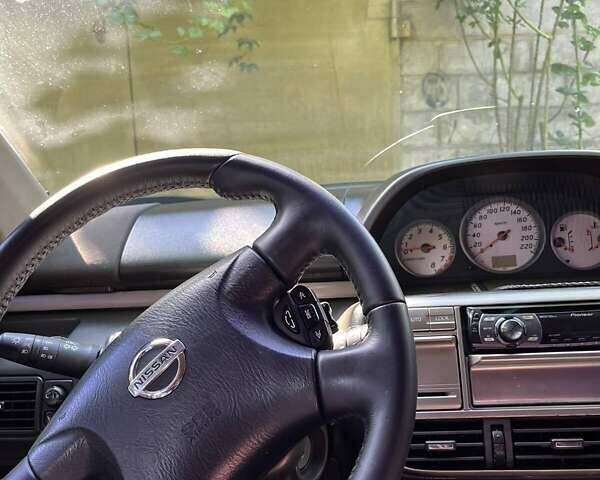 Черный Ниссан ИксТрейл, объемом двигателя 2.5 л и пробегом 287 тыс. км за 7700 $, фото 12 на Automoto.ua