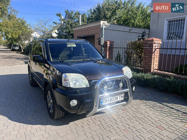 Черный Ниссан ИксТрейл, объемом двигателя 2.49 л и пробегом 176 тыс. км за 7800 $, фото 17 на Automoto.ua