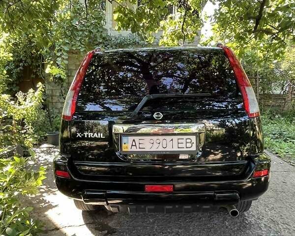 Черный Ниссан ИксТрейл, объемом двигателя 2.5 л и пробегом 287 тыс. км за 7700 $, фото 19 на Automoto.ua