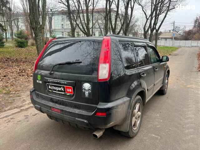 Чорний Ніссан ІксТрейл, об'ємом двигуна 2 л та пробігом 215 тис. км за 6490 $, фото 4 на Automoto.ua