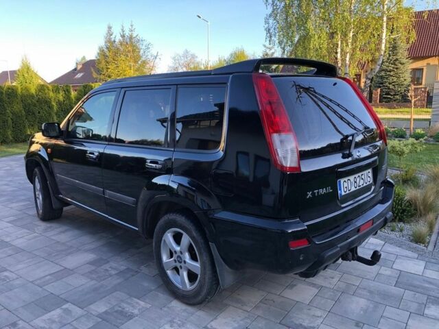 Черный Ниссан ИксТрейл, объемом двигателя 2.2 л и пробегом 310 тыс. км за 2700 $, фото 2 на Automoto.ua