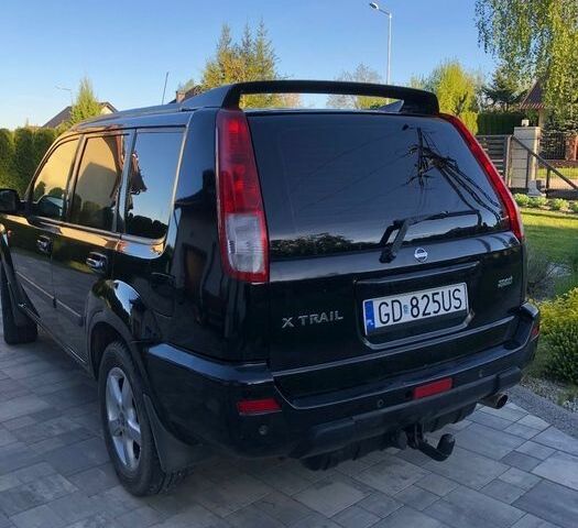Черный Ниссан ИксТрейл, объемом двигателя 2.2 л и пробегом 310 тыс. км за 2700 $, фото 1 на Automoto.ua
