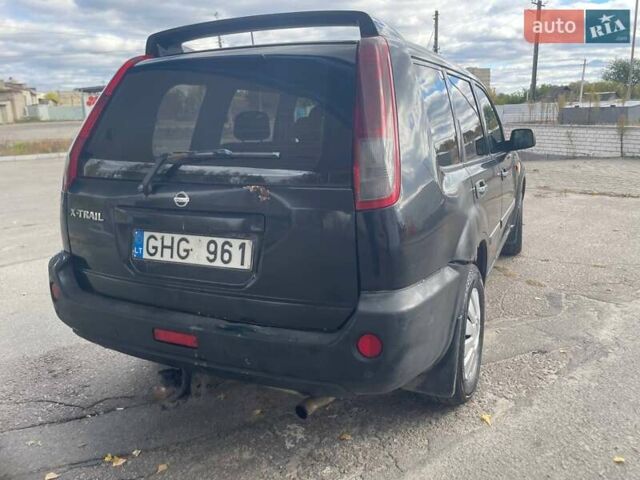 Черный Ниссан ИксТрейл, объемом двигателя 2.2 л и пробегом 308 тыс. км за 2800 $, фото 3 на Automoto.ua