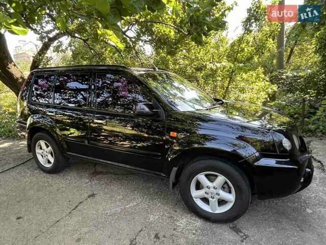 Черный Ниссан ИксТрейл, объемом двигателя 2.5 л и пробегом 287 тыс. км за 7700 $, фото 10 на Automoto.ua