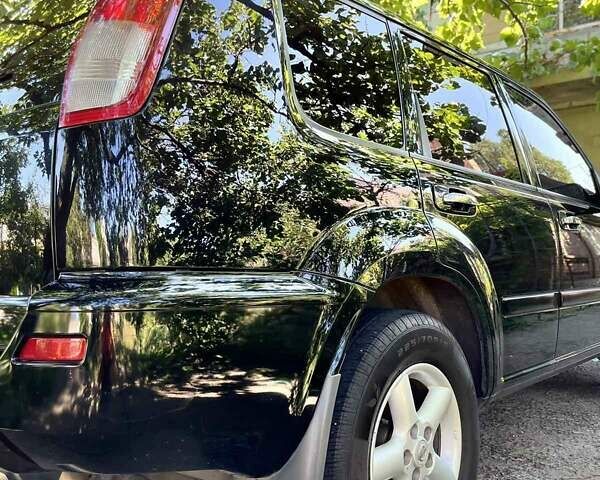 Черный Ниссан ИксТрейл, объемом двигателя 2.5 л и пробегом 287 тыс. км за 7700 $, фото 8 на Automoto.ua