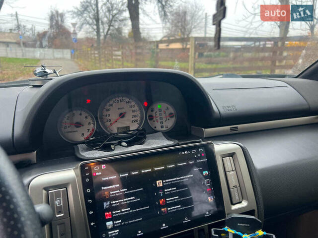 Черный Ниссан ИксТрейл, объемом двигателя 2 л и пробегом 215 тыс. км за 6490 $, фото 12 на Automoto.ua
