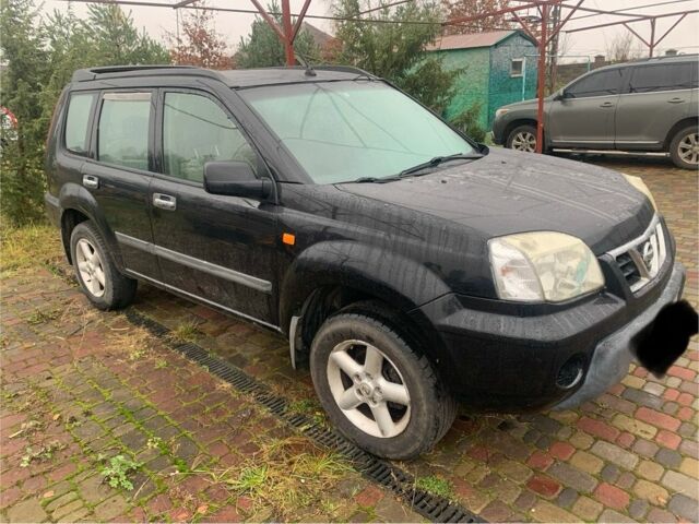 Черный Ниссан ИксТрейл, объемом двигателя 2.2 л и пробегом 370 тыс. км за 2950 $, фото 2 на Automoto.ua