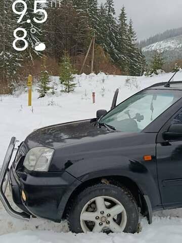 Черный Ниссан ИксТрейл, объемом двигателя 2 л и пробегом 276 тыс. км за 6000 $, фото 2 на Automoto.ua