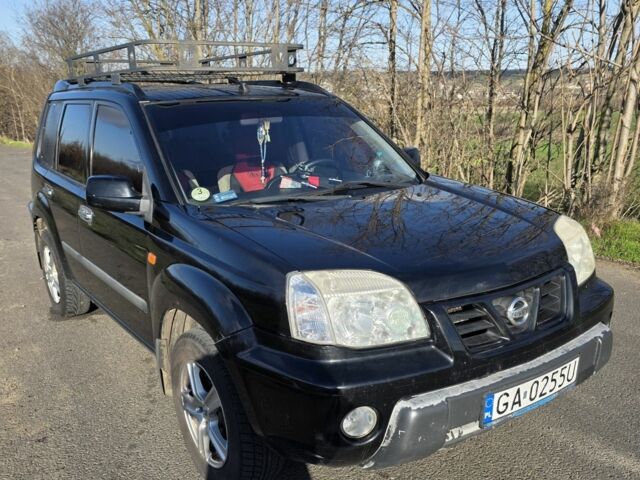 Черный Ниссан ИксТрейл, объемом двигателя 2 л и пробегом 365 тыс. км за 4013 $, фото 5 на Automoto.ua