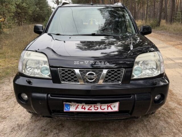 Черный Ниссан ИксТрейл, объемом двигателя 2.2 л и пробегом 225 тыс. км за 3800 $, фото 6 на Automoto.ua