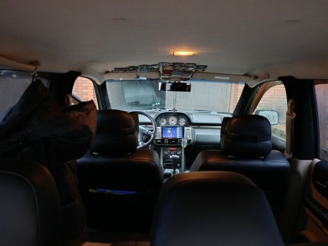 Чорний Ніссан ІксТрейл, об'ємом двигуна 2 л та пробігом 213 тис. км за 7538 $, фото 6 на Automoto.ua