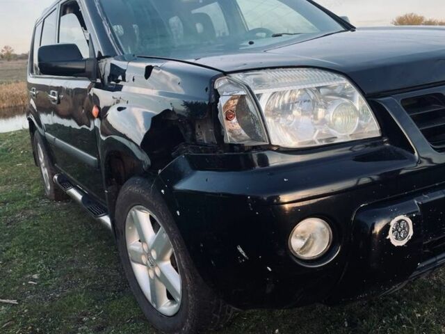 Черный Ниссан ИксТрейл, объемом двигателя 2.2 л и пробегом 400 тыс. км за 3222 $, фото 6 на Automoto.ua