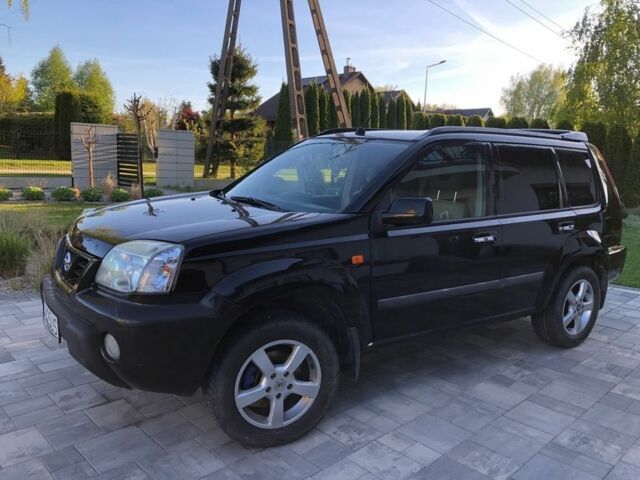 Черный Ниссан ИксТрейл, объемом двигателя 2.2 л и пробегом 310 тыс. км за 2700 $, фото 4 на Automoto.ua
