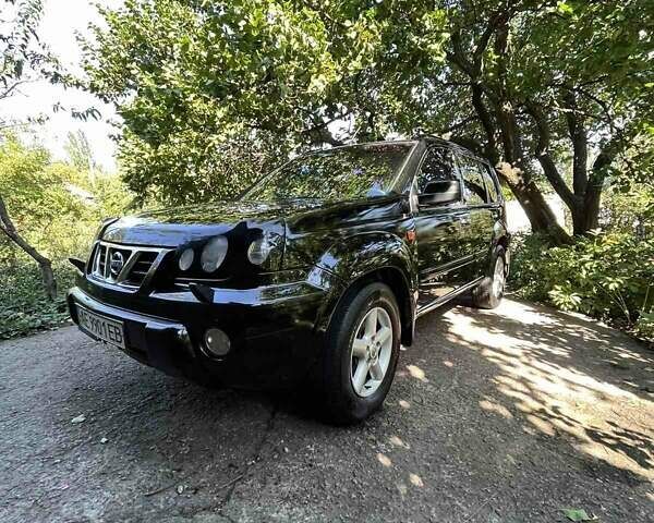 Черный Ниссан ИксТрейл, объемом двигателя 2.5 л и пробегом 287 тыс. км за 7700 $, фото 20 на Automoto.ua