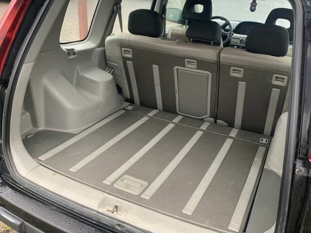 Черный Ниссан ИксТрейл, объемом двигателя 2.2 л и пробегом 370 тыс. км за 2950 $, фото 4 на Automoto.ua