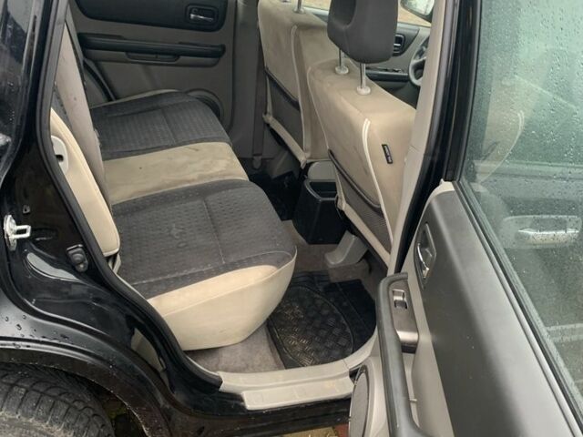 Черный Ниссан ИксТрейл, объемом двигателя 2.2 л и пробегом 370 тыс. км за 2950 $, фото 5 на Automoto.ua