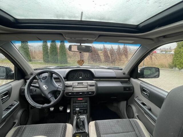 Черный Ниссан ИксТрейл, объемом двигателя 2.2 л и пробегом 290 тыс. км за 3841 $, фото 2 на Automoto.ua