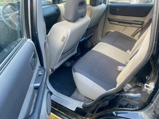 Черный Ниссан ИксТрейл, объемом двигателя 2.2 л и пробегом 339 тыс. км за 3850 $, фото 9 на Automoto.ua