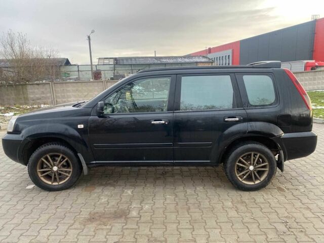 Черный Ниссан ИксТрейл, объемом двигателя 2.2 л и пробегом 251 тыс. км за 3800 $, фото 4 на Automoto.ua