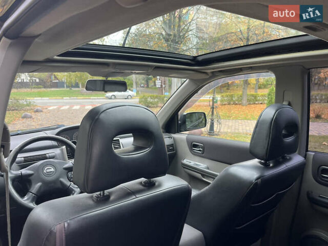 Чорний Ніссан ІксТрейл, об'ємом двигуна 2.5 л та пробігом 179 тис. км за 6800 $, фото 32 на Automoto.ua