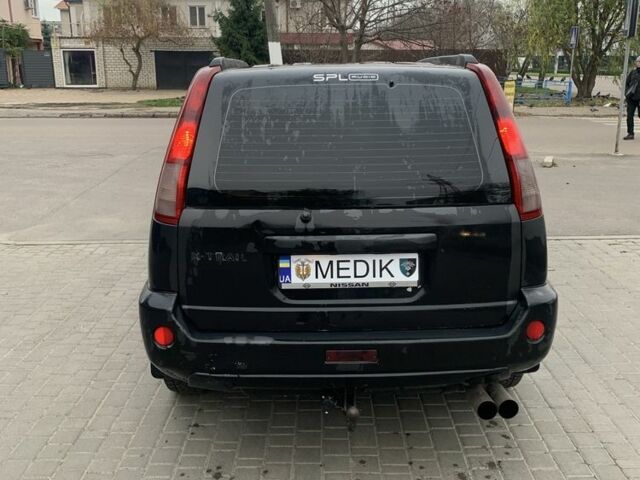 Чорний Ніссан ІксТрейл, об'ємом двигуна 2.2 л та пробігом 390 тис. км за 3561 $, фото 5 на Automoto.ua