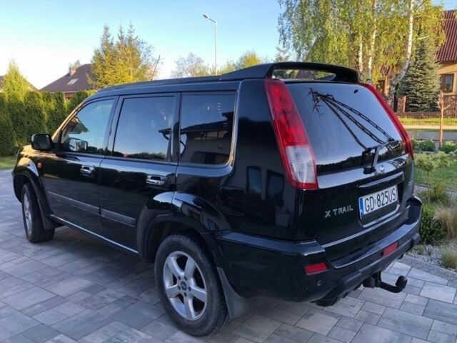 Черный Ниссан ИксТрейл, объемом двигателя 2.2 л и пробегом 266 тыс. км за 2200 $, фото 2 на Automoto.ua