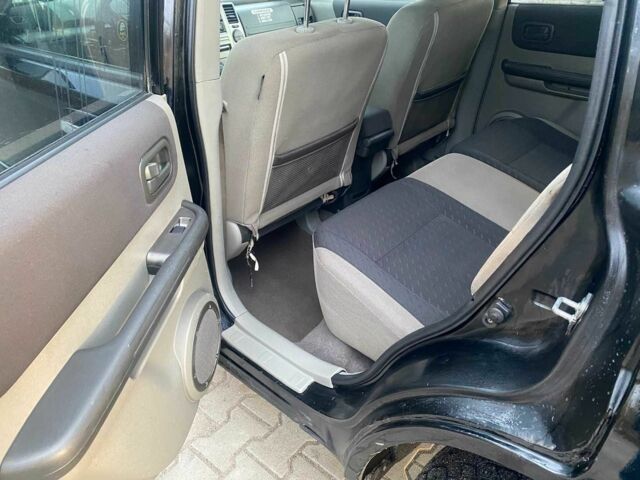 Черный Ниссан ИксТрейл, объемом двигателя 2.2 л и пробегом 251 тыс. км за 3800 $, фото 13 на Automoto.ua