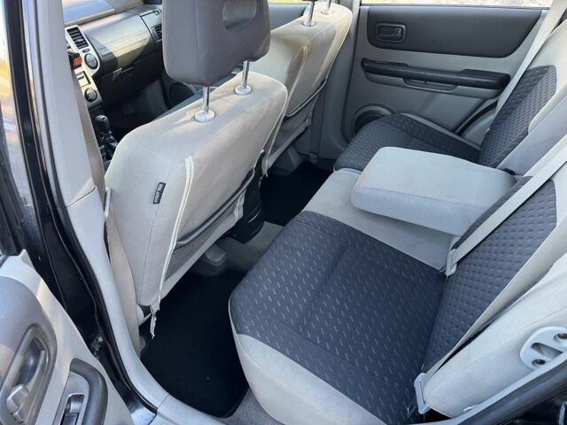 Чорний Ніссан ІксТрейл, об'ємом двигуна 2.2 л та пробігом 279 тис. км за 3483 $, фото 7 на Automoto.ua