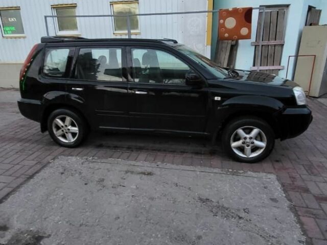 Черный Ниссан ИксТрейл, объемом двигателя 2.2 л и пробегом 222 тыс. км за 3323 $, фото 2 на Automoto.ua