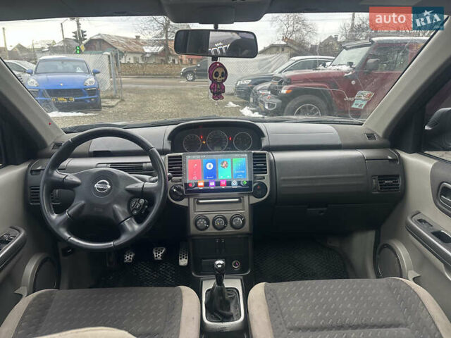 Черный Ниссан ИксТрейл, объемом двигателя 2 л и пробегом 173 тыс. км за 4700 $, фото 10 на Automoto.ua