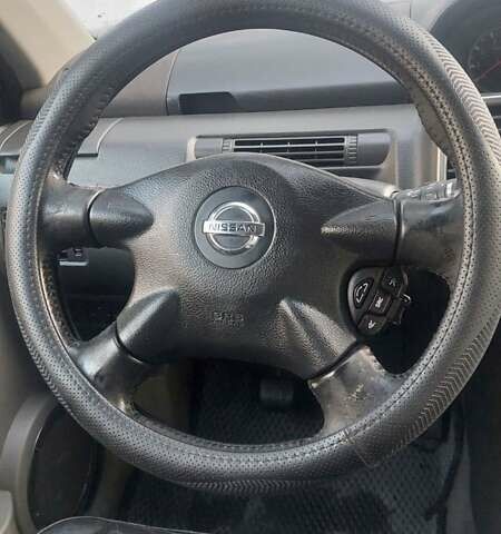 Чорний Ніссан ІксТрейл, об'ємом двигуна 2.18 л та пробігом 270 тис. км за 6300 $, фото 17 на Automoto.ua