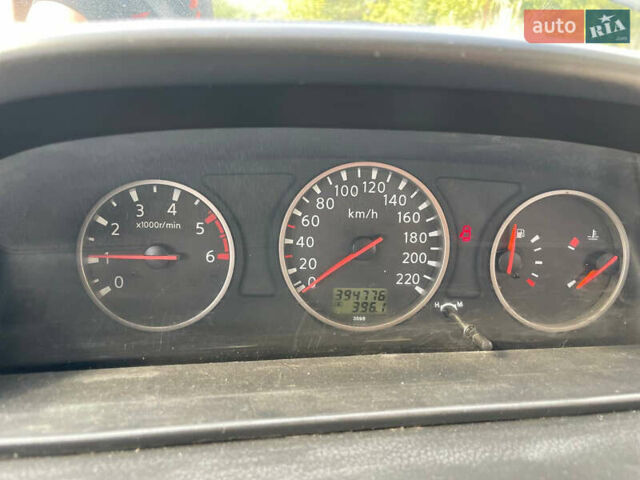 Черный Ниссан ИксТрейл, объемом двигателя 2.18 л и пробегом 394 тыс. км за 6500 $, фото 6 на Automoto.ua