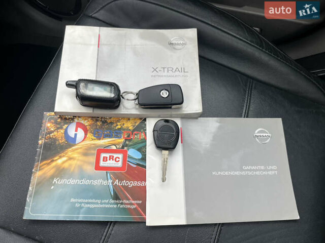 Чорний Ніссан ІксТрейл, об'ємом двигуна 2.5 л та пробігом 179 тис. км за 6800 $, фото 41 на Automoto.ua