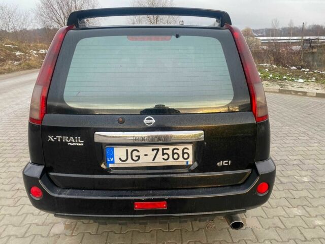 Черный Ниссан ИксТрейл, объемом двигателя 2.2 л и пробегом 251 тыс. км за 3800 $, фото 7 на Automoto.ua
