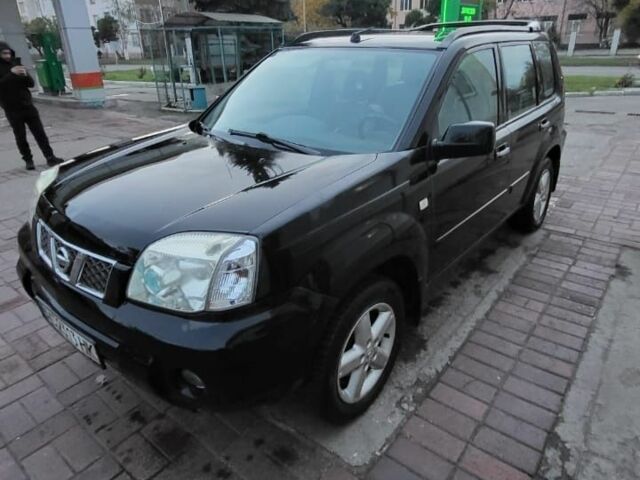 Черный Ниссан ИксТрейл, объемом двигателя 2.2 л и пробегом 222 тыс. км за 3323 $, фото 4 на Automoto.ua