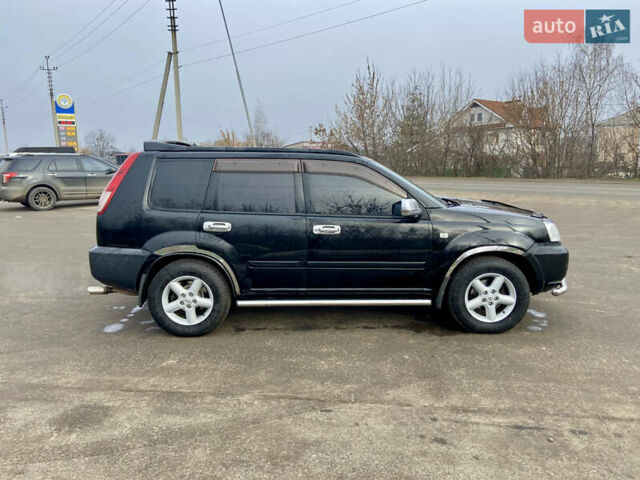 Черный Ниссан ИксТрейл, объемом двигателя 2.49 л и пробегом 300 тыс. км за 6200 $, фото 5 на Automoto.ua