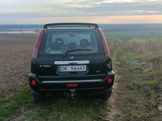 Черный Ниссан ИксТрейл, объемом двигателя 2.2 л и пробегом 294 тыс. км за 5000 $, фото 2 на Automoto.ua