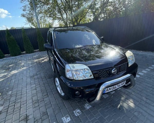 Черный Ниссан ИксТрейл, объемом двигателя 2 л и пробегом 215 тыс. км за 7000 $, фото 8 на Automoto.ua