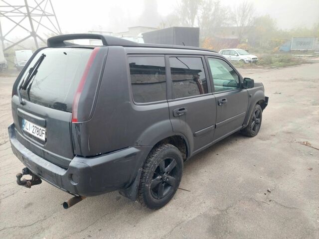 Черный Ниссан ИксТрейл, объемом двигателя 2.2 л и пробегом 250 тыс. км за 2750 $, фото 1 на Automoto.ua