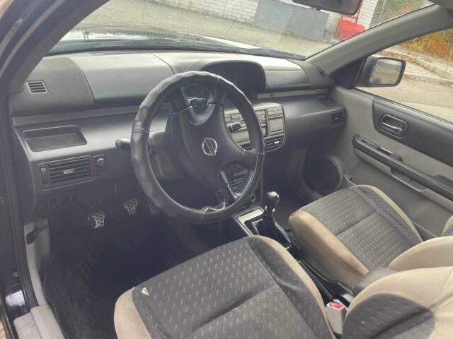 Чорний Ніссан ІксТрейл, об'ємом двигуна 2.2 л та пробігом 308 тис. км за 2800 $, фото 8 на Automoto.ua