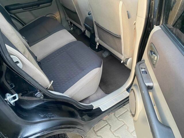 Черный Ниссан ИксТрейл, объемом двигателя 2.2 л и пробегом 251 тыс. км за 3800 $, фото 14 на Automoto.ua