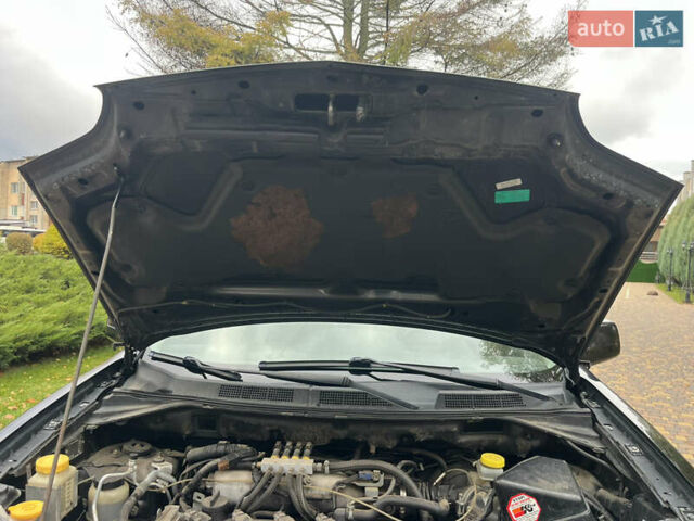Чорний Ніссан ІксТрейл, об'ємом двигуна 2.5 л та пробігом 179 тис. км за 6800 $, фото 28 на Automoto.ua